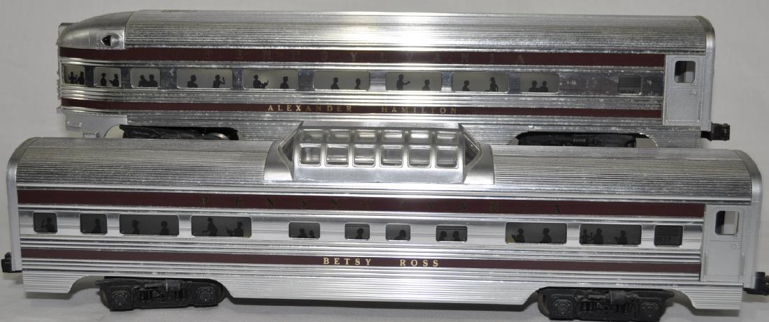 2 Lionel Congressional "O" Gauge Cars: Aluminum, #9573 Betsy Ross vista dome and #9574 Alexander Hamilton, moderate usage and wear.
