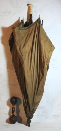 Umbrella and Dumbbell: Mid 19th century turned oak grain painted dumbbell 8.25" L and an ivory handled umbrella engraved John Towle 37" L