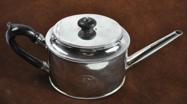 English Sterling Tea Pot: London, 1823, makers mark W. V., possibly William H. Venning, repair to handle, 5 1/2" x 11" x 4", total weight with handle: 15.145ozt