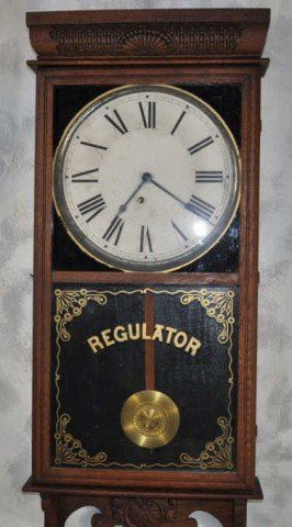 Ingrahm Wall Regulator Clock: Circa 1890, spring driven, working condition, key present, H 37" W 16"