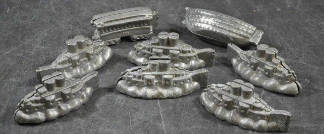 E. & Co Transportation Ice Cream Molds 8 Piece: Pewter, (6) Battleships, (1) Club Car, (1) Lifeboat, Average Dimensions 6"x2 1/2"