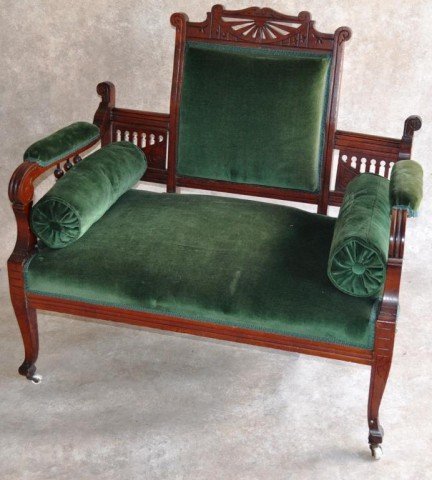 Eastlake Parlor Suite 5 Piece: Emerald green upholstered, clean finish, original ceramic casters, (1) settee featuring bolstered pillows, L 40", (2) side chairs H 35", (1) gentlemen's chair, upholstered arms, H 38", (1) platform ro