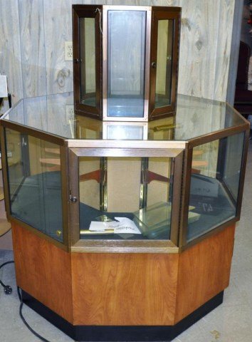 Specialty Octagonal Display Case: Two Sections, Four Swing Doors Per Section, Storage In Base, Lighted, Mirrored Back, Measurements: 54 1/2" x 42" x 42"