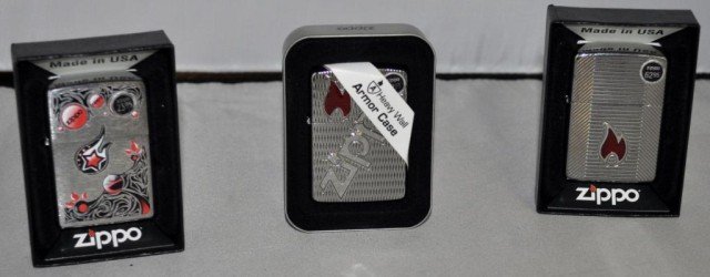 Zippo Lighters, 3 Pieces: Various Designs Featuring The Zippo Flame, Measurements: 2 1/4" 2 1/2" x 1/2"