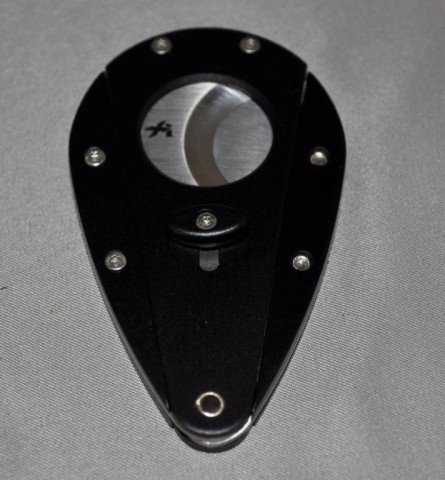 Xicar Cigar Cutter: Matte Black With Locking Feature, Measurements: 3" x 2" x 1/4"