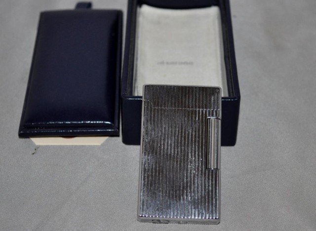 Corona Lighter: Roller "New Maggie" Style, Measurements: 2 1/2" x 1 1/2" x 1/2"