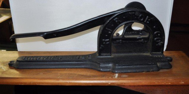 Industrial Cigar Cutter: Cast Iron Cigar Cutter For Use In Cigar Production, By R. J. R. TOB and CO."Brown's Mule", Measurements: 7 1/2" x 24 1/2" x 7 1/4"