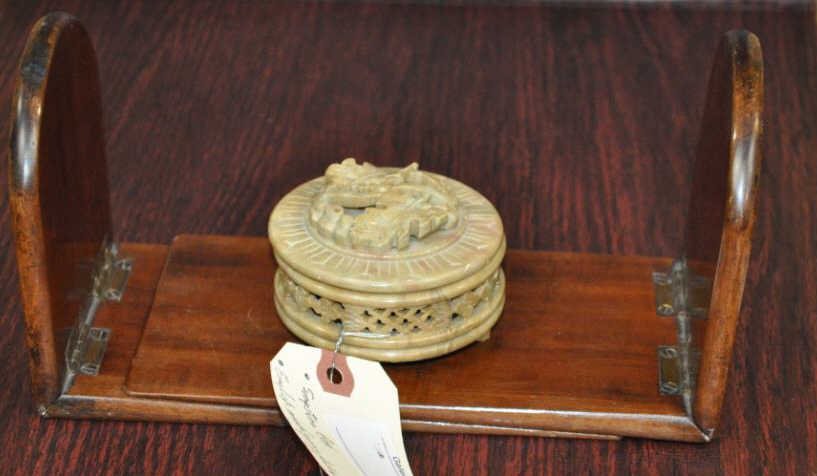 Antique English Mahogany Folding Bookends: Early 19th century, original finish, mellow patina, 5"x7.75"x4.25" each side (opened), together with a circular, reticulated soapstone box carved with a foliate motif, 2"x3.25"