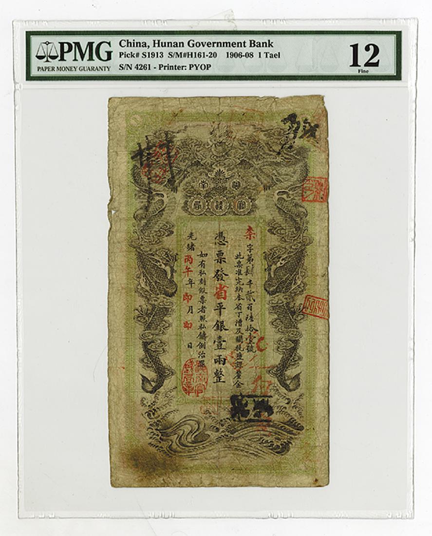Hunan Government Bank 1906-08 Banknote Issue.: China, Guang Xu bing wu year [1906], 1 Tael, P-S1913, S/M-H161-20, Issued banknote, black on green underprint, facing dragons on top, waves at bottom, numerous red seals, marks and chops, no edge faul