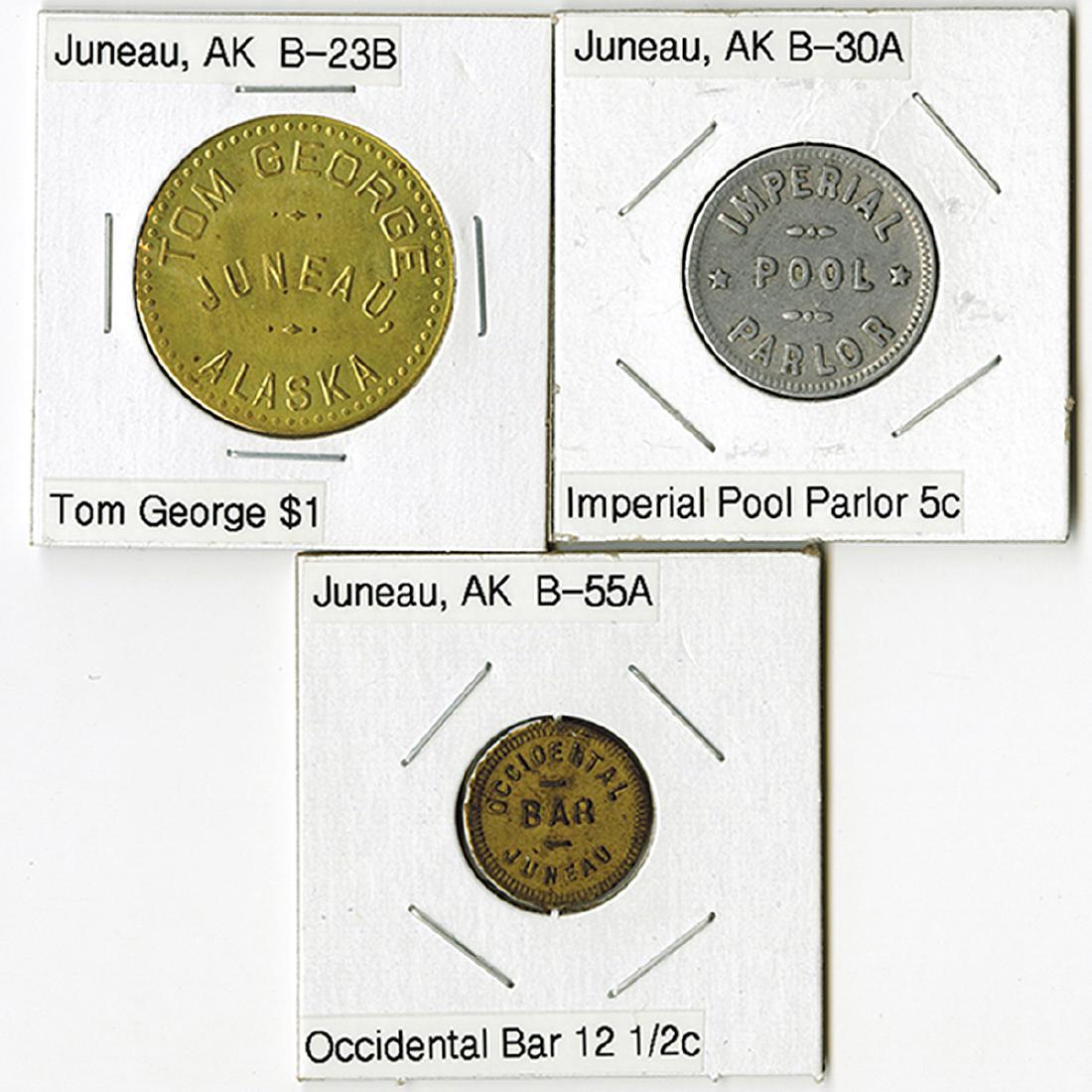 Juneau, Trio of Trade Tokens: Juneau, Alaska. Lot of 3 tokens, Includes Tom George $1, B-23B, Uncirculated; Imperial Pool Parlor 5c, B-30A, Very Fine; and Occidental Bar 12-1/2c, B-55A, Very Fine. (3)