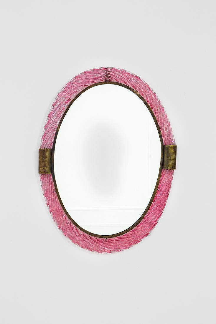 Venini: Wall mirror Mirrored glass, polished brass, torchon frame with coloured glass inclusion. Manufactured by Venini, 1935 ca. 75x57x4.5 cm Literature: Catalogo Blu, foglio 42, 43, 44, in: F. De Boni, I ve