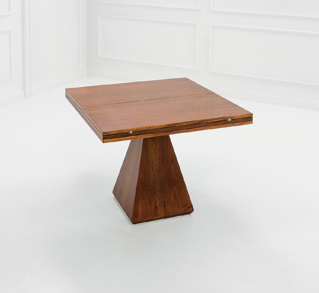 Vittorio Introini: Extendible table, 'Chelsea' model Walnut wood veneer plywood, chromed metal. Manufactured by Pozzi, 1969 ca. Manufacturer's label. Closed 75x100x100 cm, open 75x200x100 cm Literature: Literature: Casa