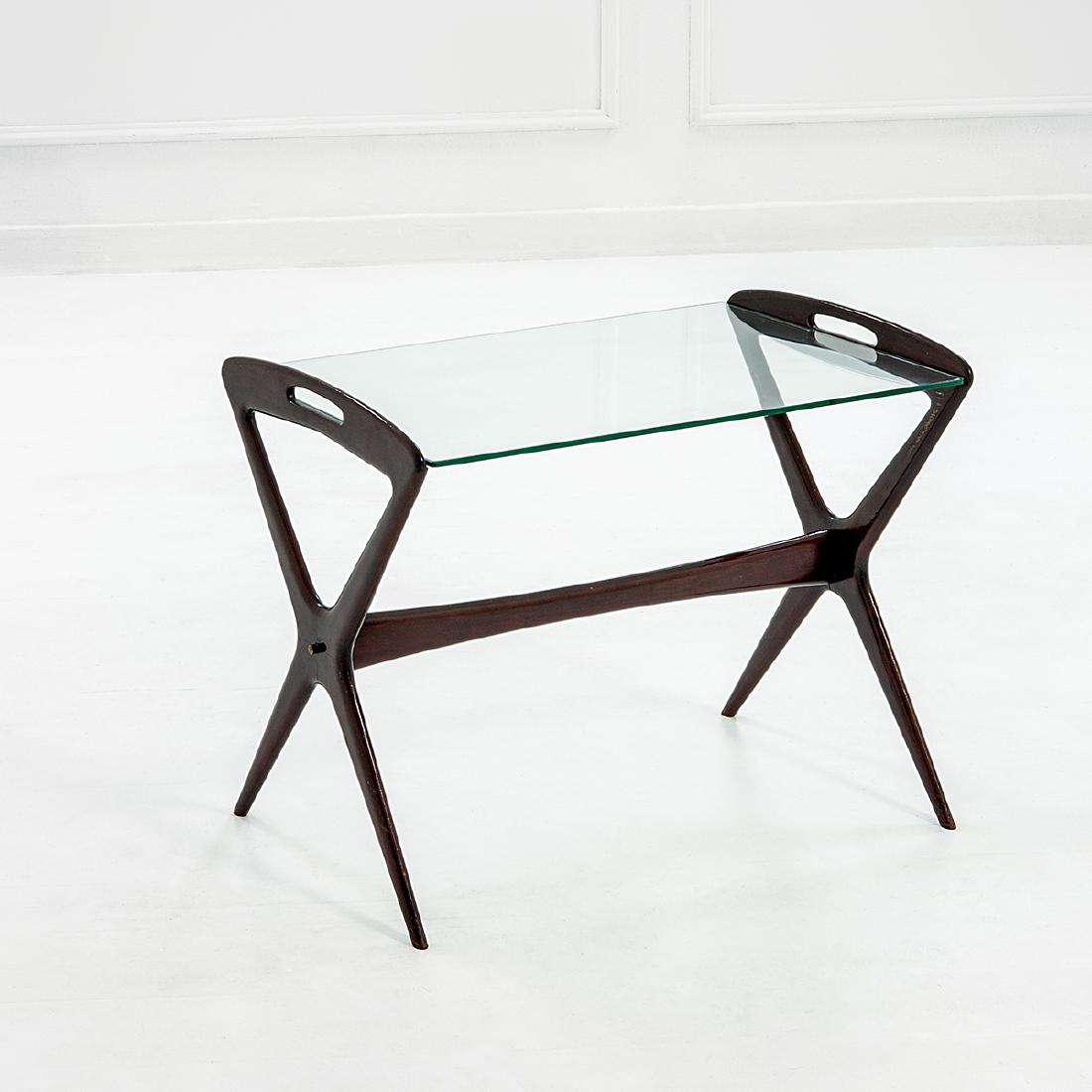 Ico Parisi: Tavolino mod. 211 Legno tinto, vetro. Prod. De Baggis, anni '50 cm 56x71x42 Literature: Roberta Lietti, Ico Parisi Design. Catalogo ragionato 1936-1960, Silvana Editoriale, Cinisello Balsamo, 2017, p.