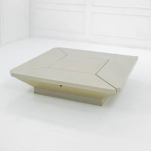Fabrizio Cocchia: Raro tavolo da cocktail mod. Coclea Legno rivestito in laminato plastico, metallo cromato. Prod. Sormani, 1971 ca. cm 37x150x150; h max cm 59 Literature: Catalogo di produzione Sormani.