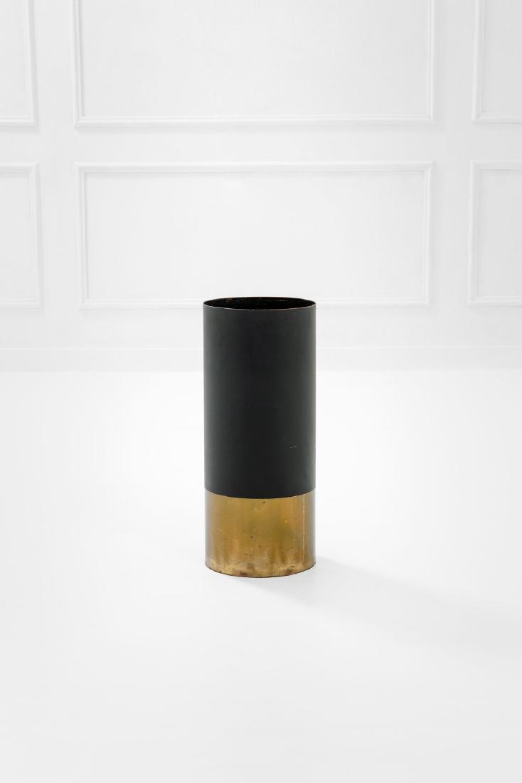 Luigi Caccia Dominioni: Portaombrelli mod. 0G13 detto Cartuccia Ottone, lamiera smaltata. Prod. Azucena, 1955 ca. h cm 60, diam. cm 26 Literature: Domus, n. 295, giugno 1954, p. 46.