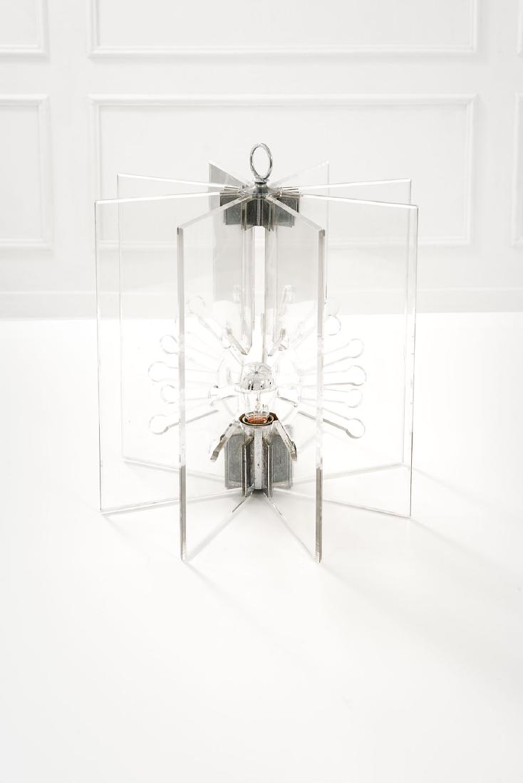 Franco Albini: Lampada da tavolo mod. 524 Ottone cromato, metacrilato trasparente. Prod. Arteluce, 1963 ca. cm 46x42x42 Literature: G. Gramigna, Repertorio del design italiano per l'arredamento domestico 1950-2000,