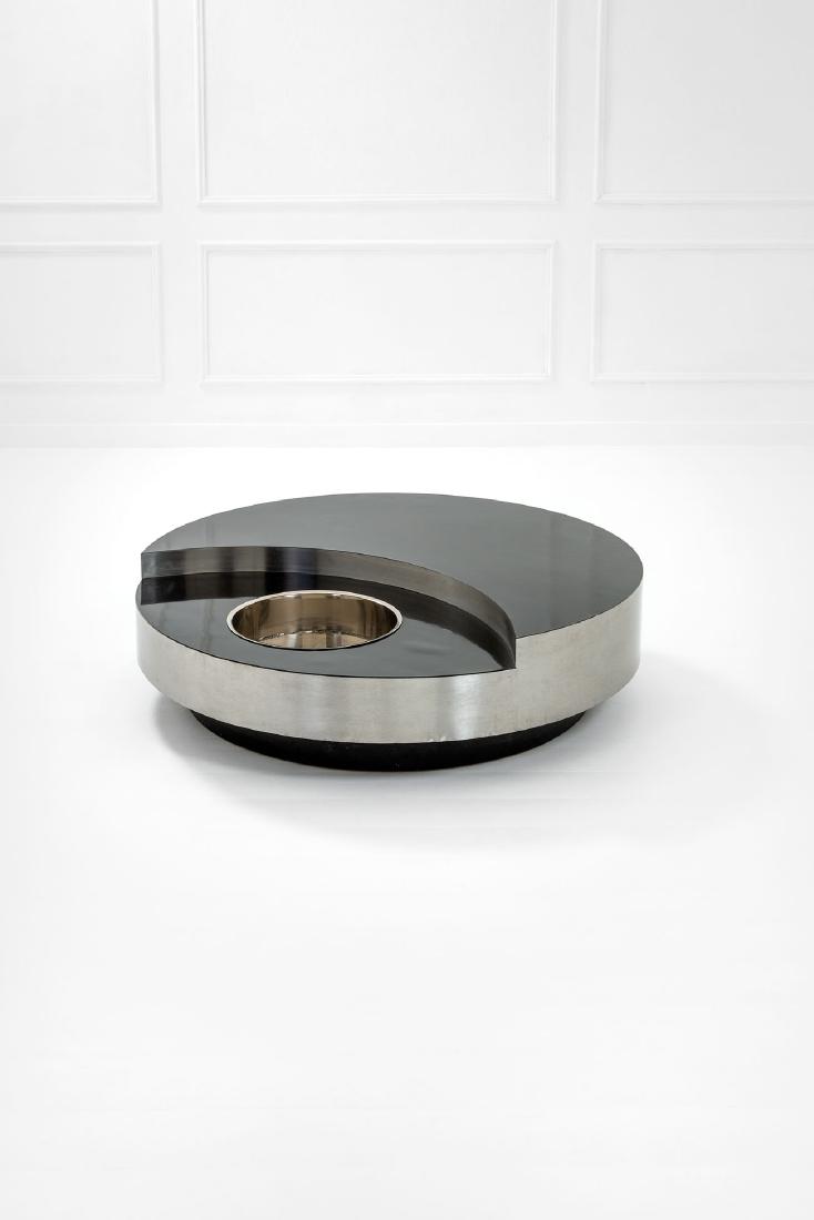 Willy Rizzo: Tavolino girevole mod. TRG Legno, acciaio, laminato plastico. 1970 ca. h cm 35, diam. cm 128