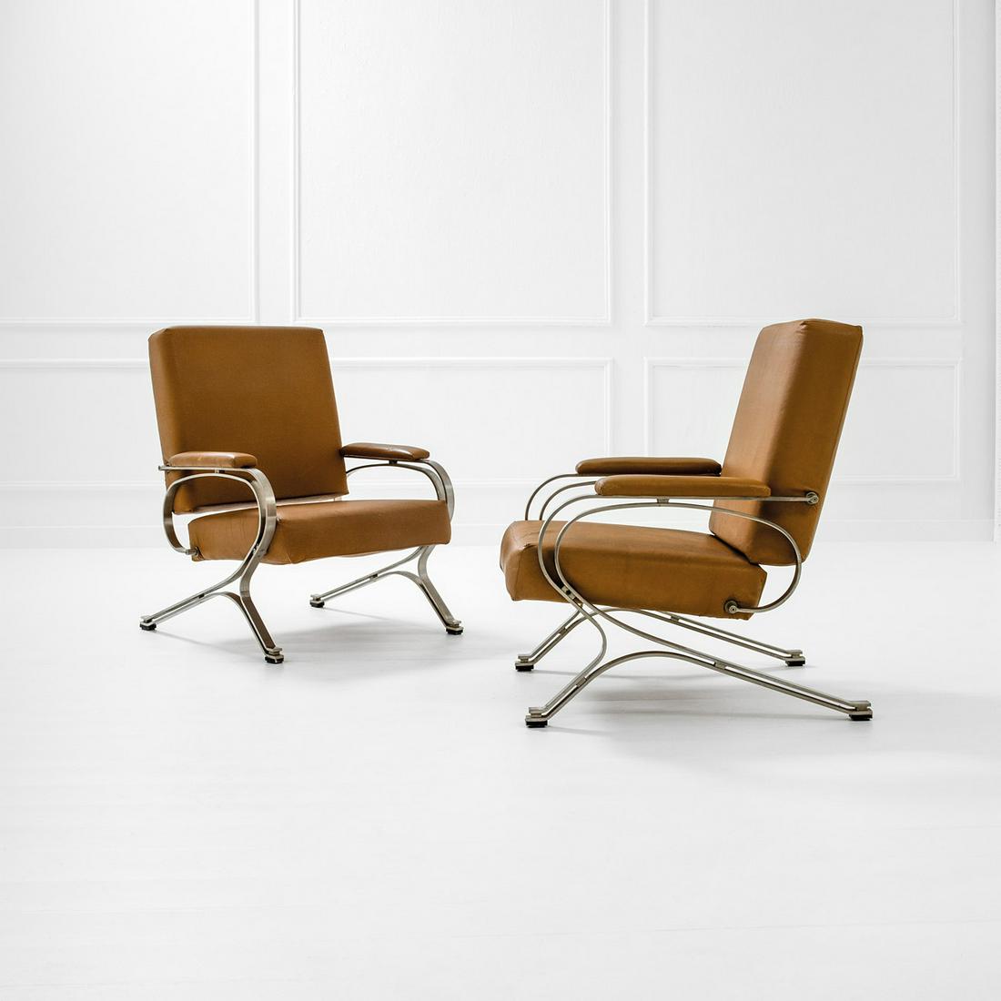 Gianni Moscatelli: Coppia di poltrone mod. Micaela Acciaio, vinilpelle. Prod. Formanova, 1970 ca. Etichetta del produttore. cm 94x71x80 Literature: Catalogo di produzione Formanova, pp. 24 - 25.