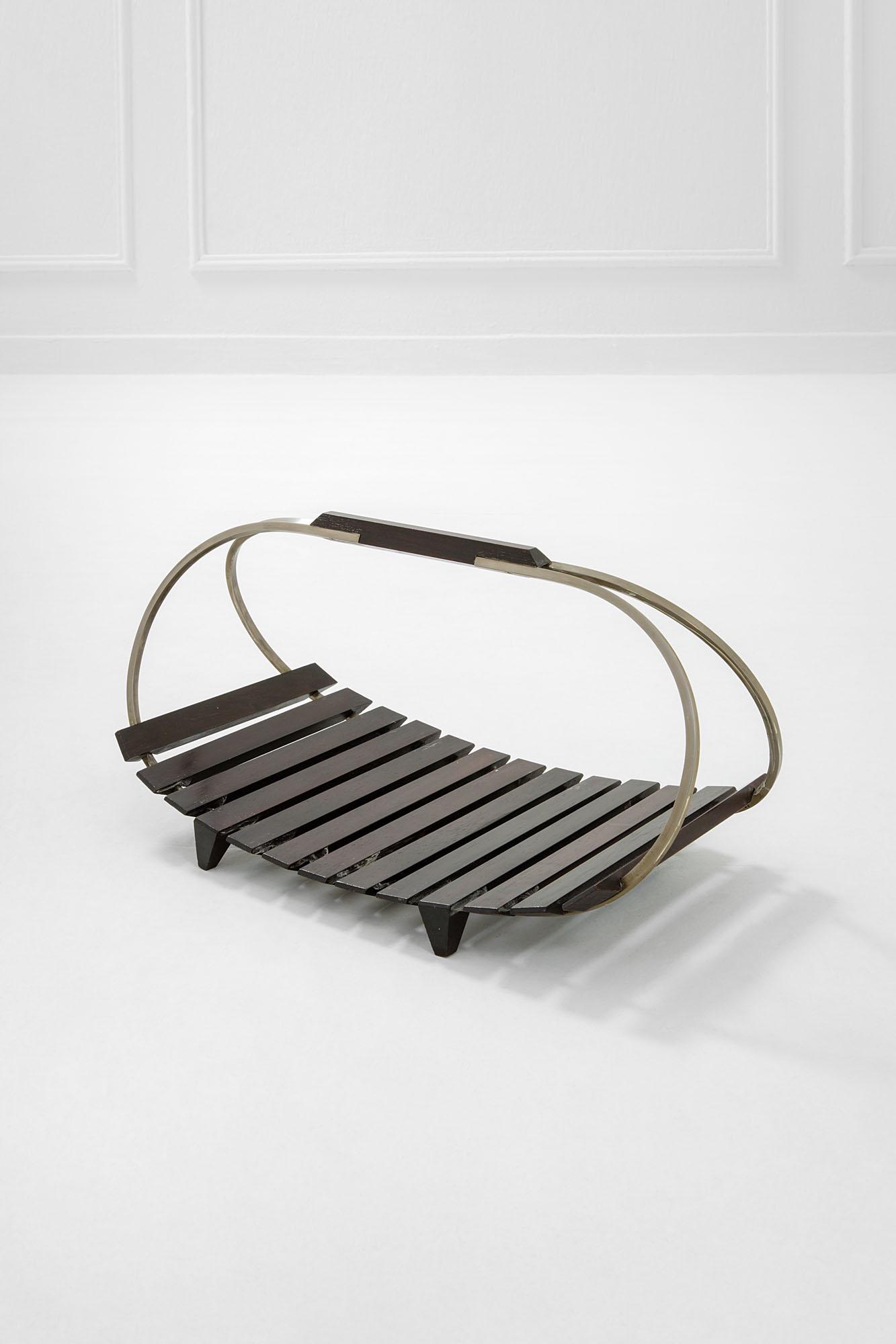 Ico Parisi: Portariviste Legno, metallo nichelato. Prod. Stildomus, 1960 ca. cm 28x57x32 Literature: Roberta Lietti, Ico Parisi Design Catalogo ragionato 1936-1960, Silvana Editoriale 2017, p. 604.