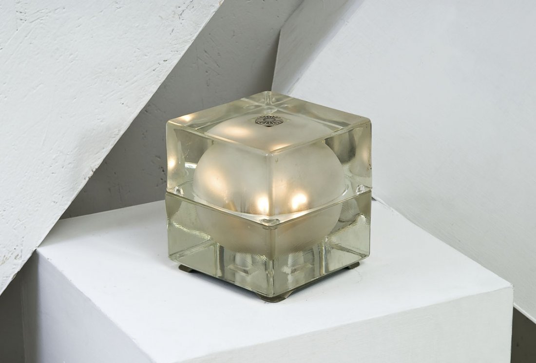 Alessandro Mendini: Lampada da tavolo mod. Cubosfera Struttura costituita da due valve in vetro stampato con cavità interna sferica sabbiata. Prod. Fidenza Vetraria dal 1968 cm 17x16x16 Literature: Domus, n. 467, ottobr