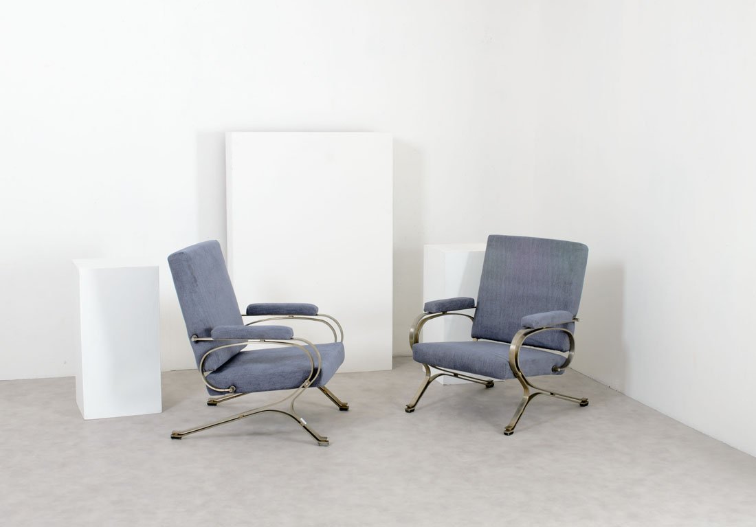 Gianni Moscatelli: Rara coppia di poltrone Micaela Acciaio satinato, tessuto. Prod. Formanova, anni '70 cm 95x73x72 Literature: Catalogo di produzione Formanova, pp. 24, 25.