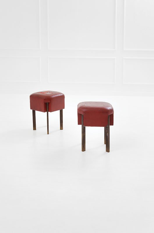 Roberto Gabetti, Aimaro Isola: Two stools Brass, skai upholstery. Turin, 1955 ca. Model originally designed for Turin Stock Exchange. 53x39x39 cm