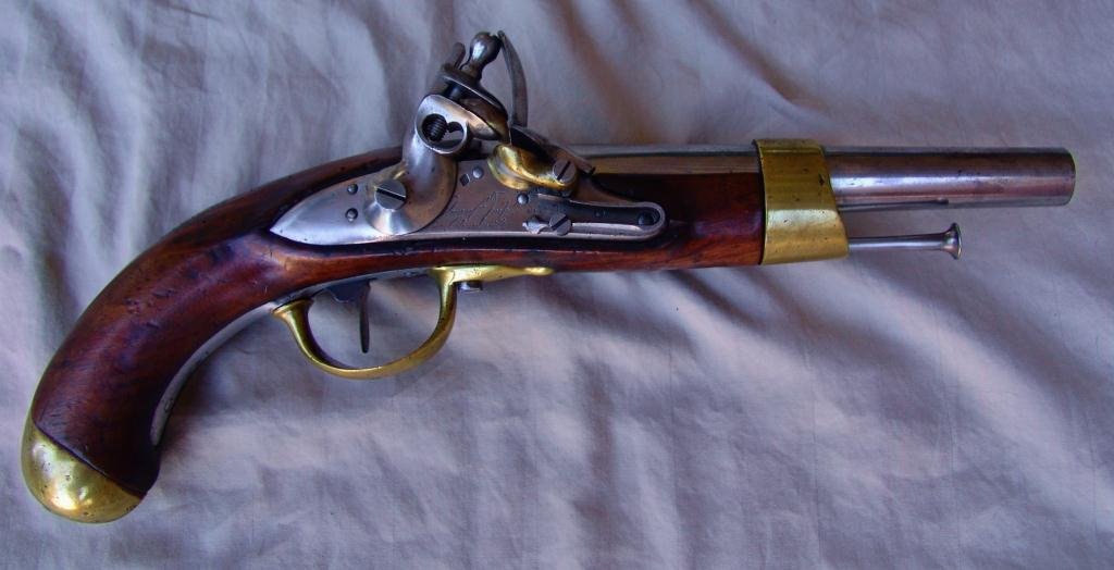 Antique Flintlock Pistol: maker name Charleville engraved on lockplate, iron back strap with brass knob on pistol grip and brass end cap, original ram rod, caliber = .67, stamped man 13 on back strap, unknown maker, Overall Le
