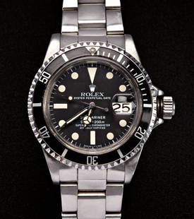 ROLEX SUBMARINER OYSTER PERPETUAL DATE WRIST WATCH: . The steel case with black dial and date aperture on a signed link bracelet.