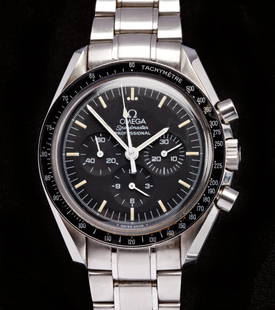 OMEGA SPEEDMASTER PROFESSIONAL GENTLEMAN'S WATCH: SWISS, c.1998. The signed black dial with three subsidiary dials, with outer Tachymetre scale, stainless steel case with signed screw down back and two push buttons, and signed track-link bracelet