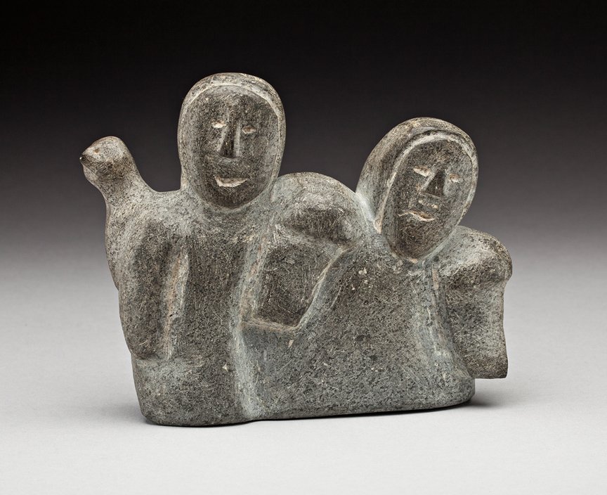 Yaha Angnayuinak (1907-1980) m.: Arviat (Eskimo Point), Couple with Bird, ca. late 1960s, grey stone, signed in syllabics, 5 x 6 x 1.5 in, 12.3 x 15.2 x 4.3 cm. --- CATEGORIES: Inuit, Eskimo