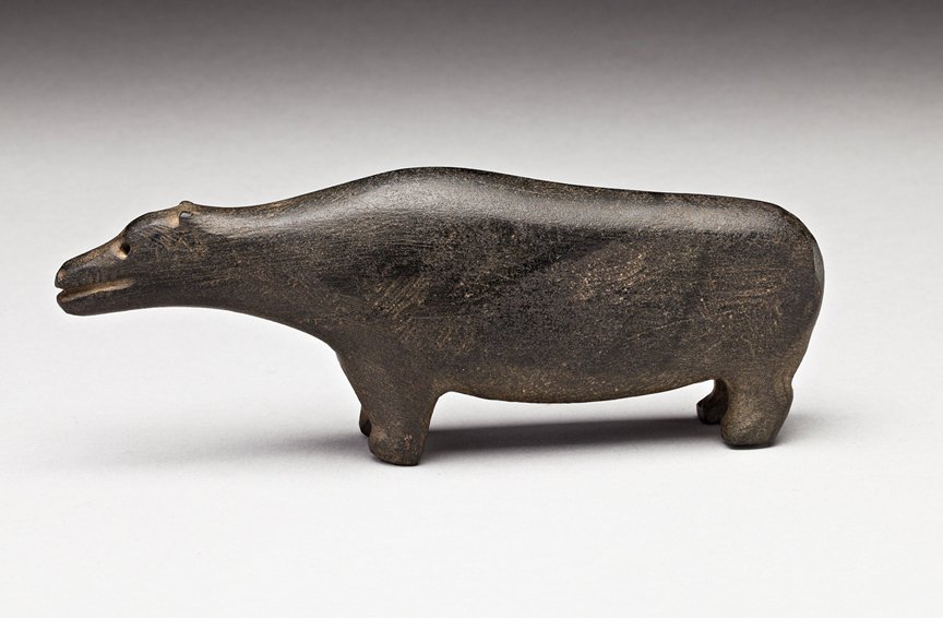Jimmy Taipanak (1919-2000): Baker Lake, Bear, 1970s, black stone, 2.25 x 6.25 x 1.25 in, 6 x 15.9 x 3 cm. --- CATEGORIES: Inuit, Eskimo