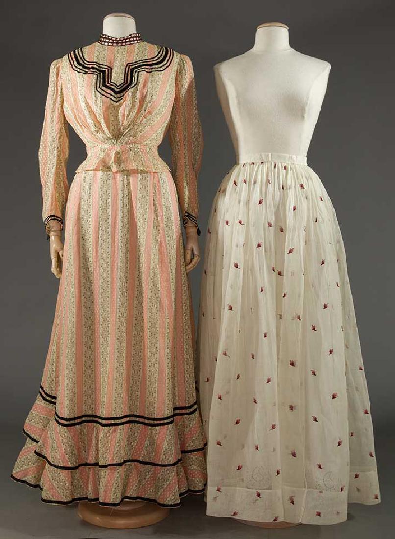 ONE DRESS & ONE SKIRT, 1900 & 1860: 1 2-piece dotted Swiss day dress, pink & white stripes, the white stripes w/ brown print, black velvet trim, B to 38", W 29", Skirt L 43"-47", (CF peplum tear, small tear to ribbon) excellent & 1 1860