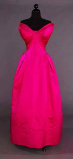 TRAVILLA HOT PINK BALL GOWN, 1950s: Hot pink silk satin, strapless, padded exagerated H, bands from B to CS neckline, boned bodice, rayon lining, labeled, B 34", W 24", CFL 49", (inset W band 1" unstitched at zipper, very slight discolo