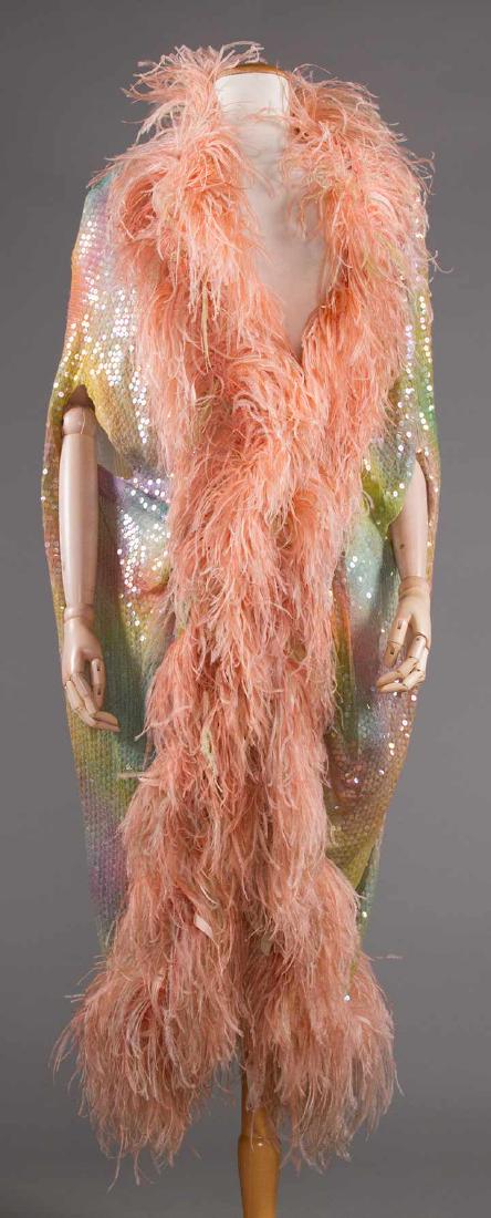 ADOLFO SEQUINED & FEATHERED EVENING CAPE, 1980s: Mottled pink, green & blue chiffon covered in rows of clear sequins w/ peach ostrich feather trim, label "Adolfo", L 43" (sequin loss at edges of armhole) very good; t/w 1 Adolfo velvet & lame cut to