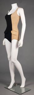 RUDI GERNREICH KNIT BATHING SUIT, 1960-1970: Two-tone, black & camel wool knit, the camel side w/ 2 faux pocket flaps, label "Rudi Gernreich for Harmon Knitwear", B 35", W 28", (4 moth holes by camel side seam) very good.