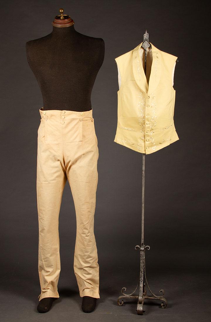 NANKEEN TROUSERS & WOOL VEST, EARLY-MID 19TH C: Fall front pants, fabric covered buttons, 2 H pockets, bone suspender buttons, pair of back laces, W 32", Ins 33", (missing 1 boot strap, tiny holes at crotch, scattered small brown stains, 1 large br