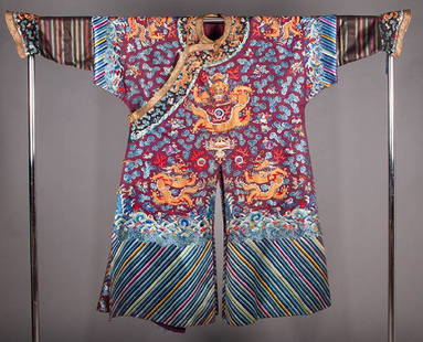 EMBROIDERED NINE DRAGON ROBE, CHINA: Plum silk, 9 couched gold dragons, colorfully embroidered w/ flaming pearls, bats, clouds & auspicious symbols, dragon embroidered horseshoe cuffs & borders, Cuff-Cuff 86", L 53", (2 broken loops, col