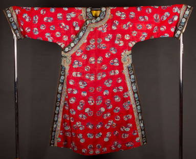 RED SILK KESI ROBE, CHINA, LATE 19TH C: Red silk faille w/ tapestry woven & printed small rondels in shades of blue, neck & cuff bands in black w/ blue Kesi rondels & narrow brocade ribbon, brass ball buttons, chrome yellow silk damask lini