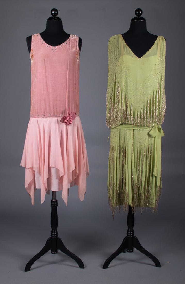 ONE PINK & ONE GREEN FLAPPER DRESS, 1920s: Both sleeveless w/ handkerchief hems: 1 pea green silk chiffon w/ gold beaded fringe trim, B 36â€, H 38â€, L 43â€, (many stains, shredded slip, bead losses) & 1 pink velver w/ light pink silk