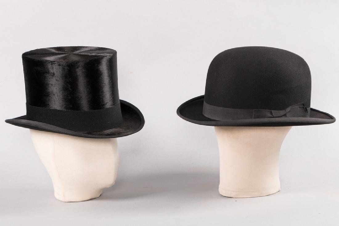 BOWLER & TOP HAT WITH ORIGINAL BOXES, EARLY 20TH C: 1 Brooks Bros. silk top hat w/ original box, (sweat band cracking), very good; 1 black wool deadstock bowler w/ Dobbs stamped lining (lining detached); 2 Dobbs hat boxes; Provenance: Dyer, Rhode Islan