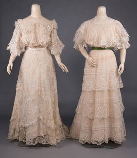 TWO CREAM LACE TEA GOWNS, 1900-1910: Both 2-pc w/ tiered skirts, short sleeves & lace on net: 1 w/ delicate & elaborate Battenburg lace inset into net ground, off the shoulder neck line, B 38", W 27", Skt L 41-61", (unlined skirt & shred