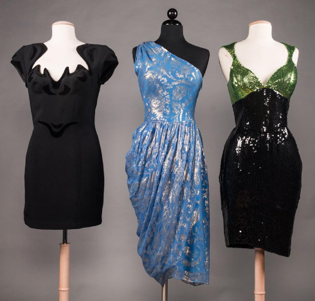 TWO MUGLER & ONE BLASS EVENING DRESSES, LATE 20TH C: 1 1960s Bill Blass blue w/ silver lame brocade, sarong style dress, B 36", W 26.5", L 44", (missing belt, small 0.5" stain in seat, large lining stains); 2 1990s labeled "Thierry Mugler, Paris": 1 bla