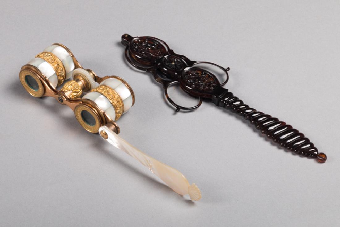 M.O.P. OPERA GLASSES & SHELL LORGNETTES, MID 19TH C: 1 pair, c. 1850 opera glasses inset w/ mother of pearl & original leather box, (box latch broken, corrosion around lenses); 1 carved brown shell w/ 2 pair of lenses, both very good. MCNY.