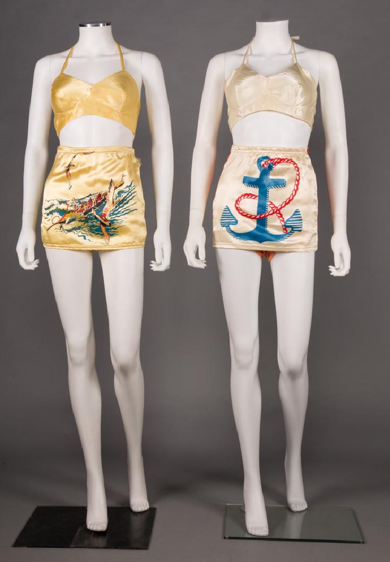 TWO 2-PIECE BATHING SUITS, EARLY 1940s: Both Rayon satin w/ stenciled designs & w/ halter tie tops: 1 yellow, B 34", H 33", (W elastic stretched, seam opening, top button moved to make it 1.5" smaller); 1 white w/ blue & red anchor, B 34", 