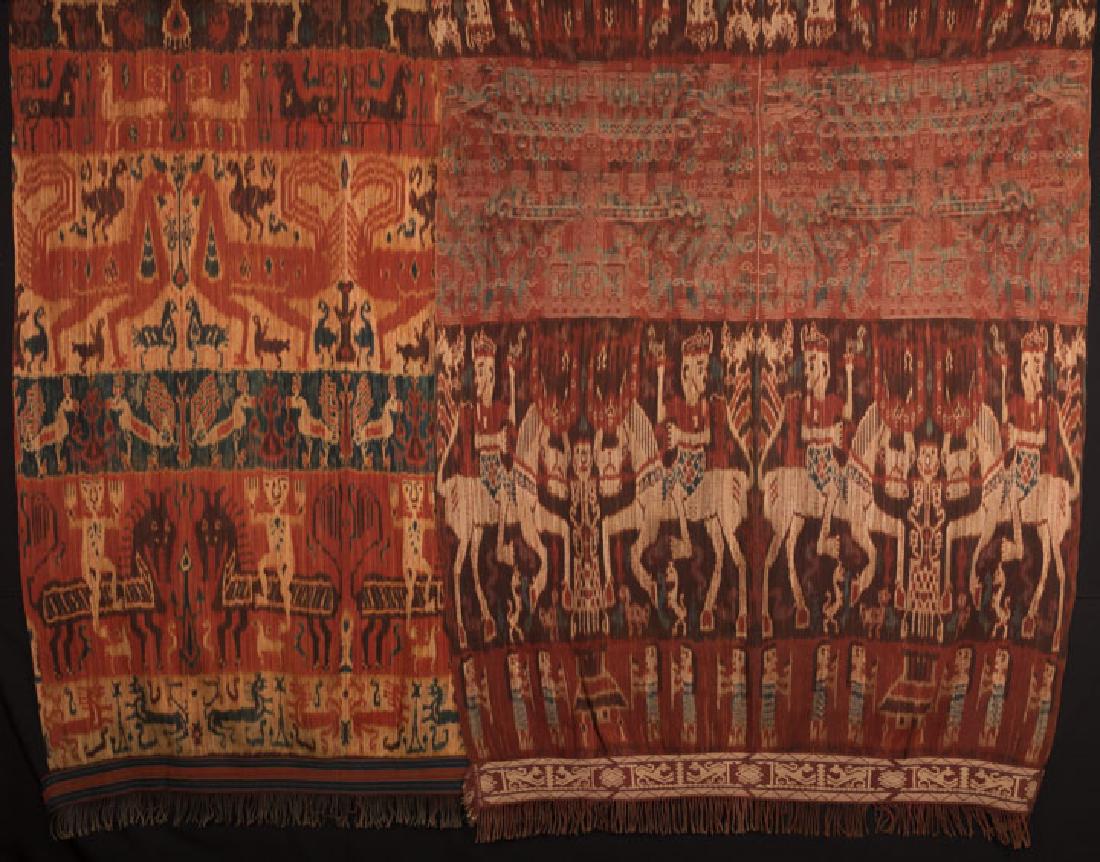 TWO HINGGI MENS' IKAT WEAVINGS,, INDONESIA, 20TH C: Both in shades of rust, indigo & tan: 1 w/ peacocks & mounted figures on black horses, 57" x 118" & 1 burgundy w/ center embroidered panel, male figures on cream horses, 56" x 106", both excellent; t/