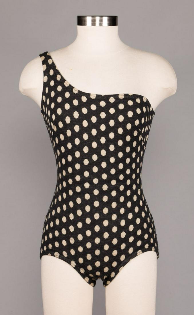 ONE SHOULDER WOOL BATHING SUIT, 1950-1960s: 1-pc wool polka dot 1 SH bathing suit, unlabeled "Rudi Gernreich", B 35", W 28", L 25", (few small pulls) good- very good.