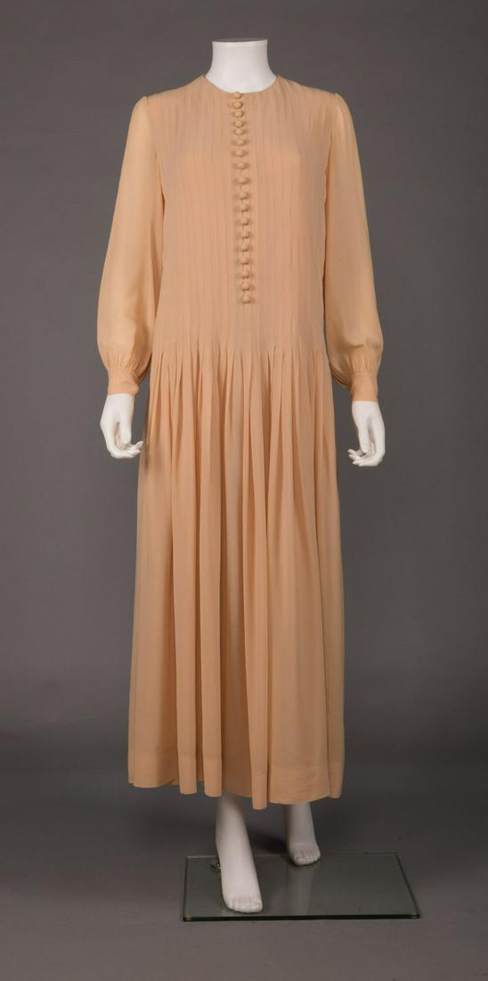 MME GRES CHIFFON DAY DRESS, 1960s: Taupe silk crepe day dress, bodice pleated & tucked to low W, long bishop sleeve, self-fabric ball button at CF & cuffs, unlined, couture construction, unlabeled Mme. Gres, B 38", Low W 36", L 52", (t