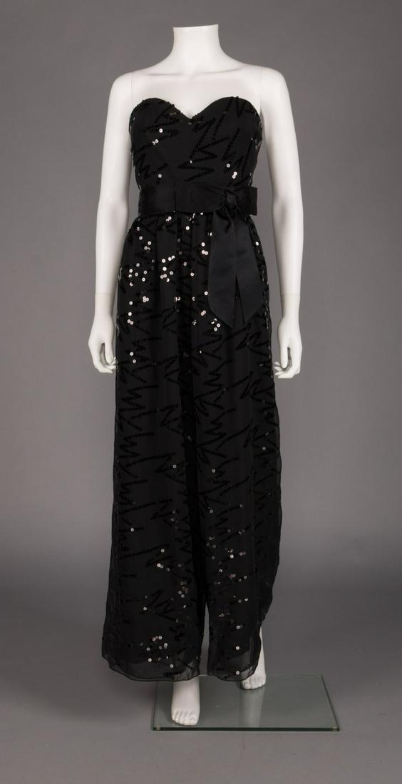 STRAPLESS & SEQUINED EVENING JUMPSUIT, 1980s: Deadstock black strapless evening jumpsuit w/ bowed satin self-belt, wide leg, zigzag sequin motif, label "Ann Lawrence", B 34", W 28", L 51.5", Ins 28.5", (few loose sequins) excellent; t/w 2 black e