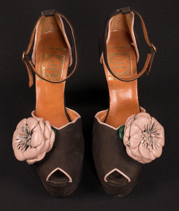 CHELSEA COBBLER PLATFORM HEELS, LONDON, c. 1971: Chocolate brown open toe platform heels w/ ankle strap & putty pink leather floral rosette, as seen in Vogue UK January 1972 in alternate colorway, identical pair seen in 2018 Stuart Weitzman "Walk Th