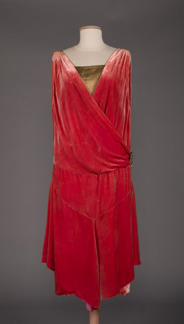 VELVET & LAME EVENING GOWN, MID 1920S: Pink velvet evening dress w/ gold lame & velvet slip, faux wrap bodice w/ rhinestone buckle, low back & handkerchief hem, B 36", Low W 36", L 46", (group of stains 4" x 6" at back right W, small stain